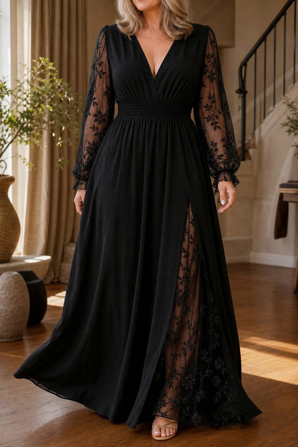 Long sleeved lace maxi dress, indoors in warm light